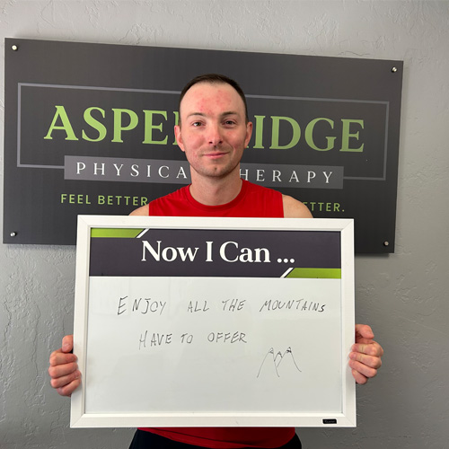 a satisfied patient from Aspen Ridge Physical Therapy after a successful physical therapy program, ready to get back to the mountains